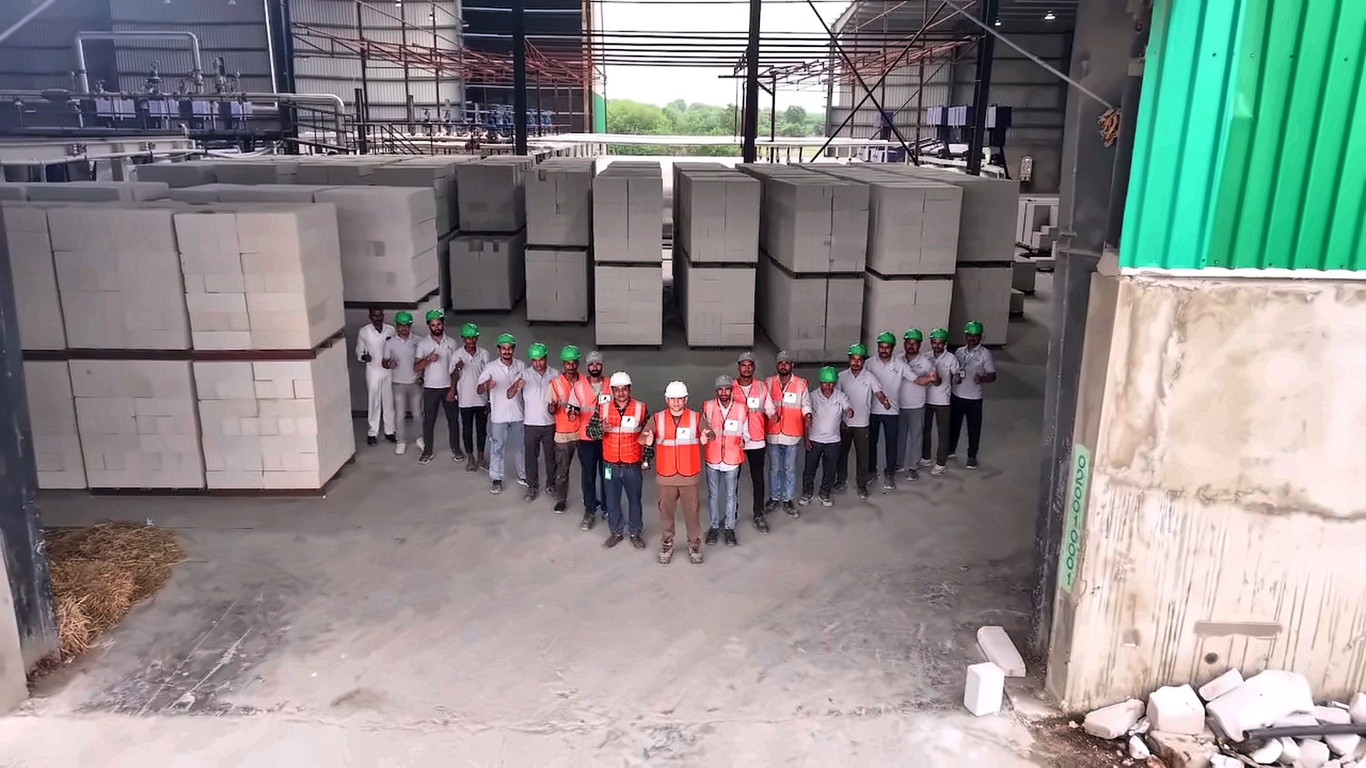 The Brickcem team standing in the finished-goods yard at the plant